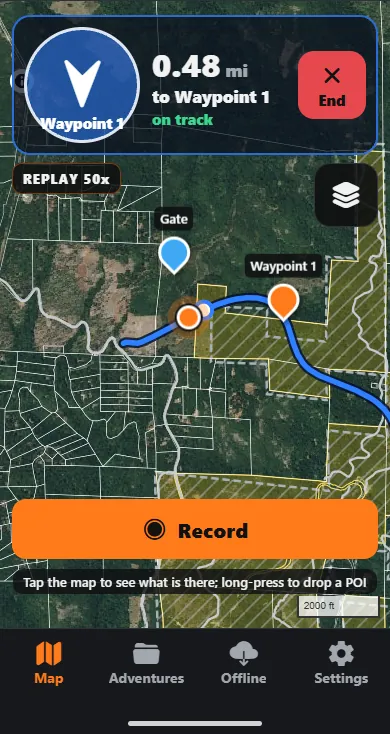 Navigate dial at the top of the map: an arrow pointing to Waypoint 1, 0.48 miles away, on track, over a satellite map with the saved track in blue.